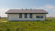 Строящийся дом 96 м.кв из газобетона от застройщика в Барнауле, ЖК Березовый мыс, ул Булгакова, 43, вид сбоку